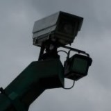 Security camera at the gate of the NATS compound