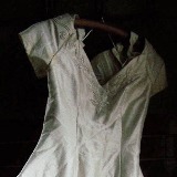 A wedding dress found in a room containing patients' belongings