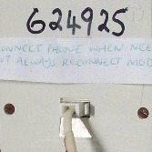 The notice reminds users to plug the modem back in after   <br> using the 'phone. Those were the days...
